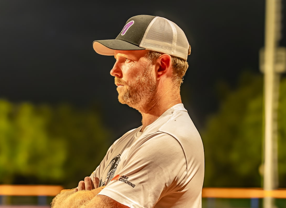 Mike MacDowell coaching from the base line.